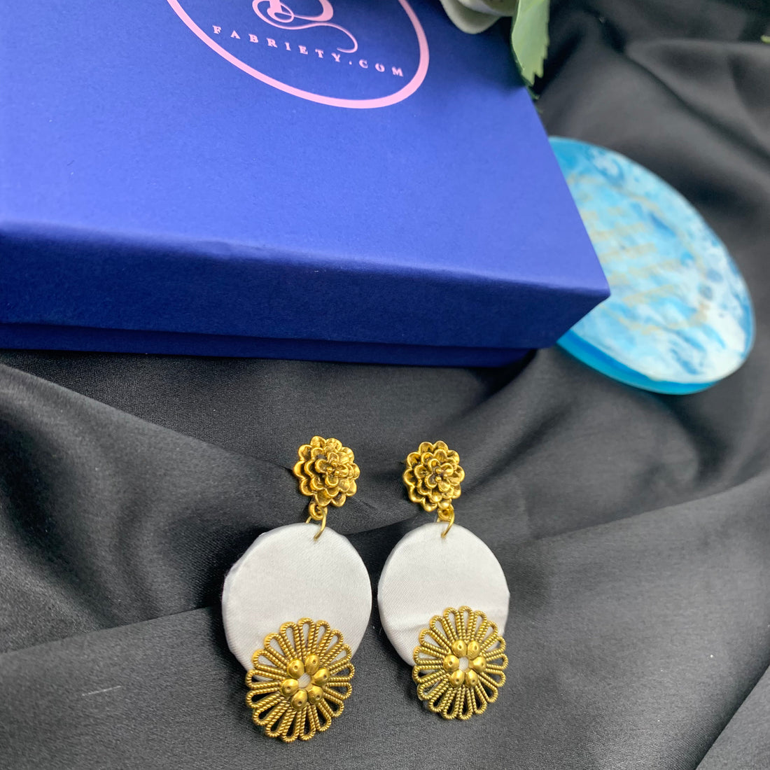 White Fabric Circular Earrings with Golden Charms