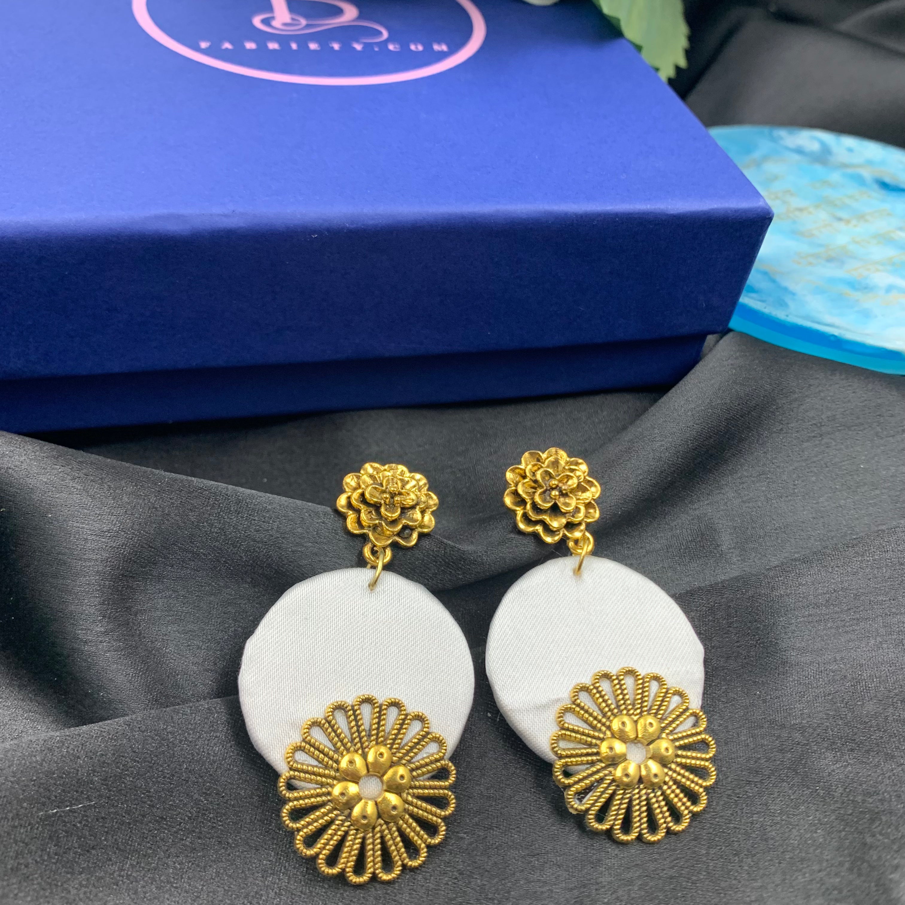 White Fabric Circular Earrings with Golden Charms