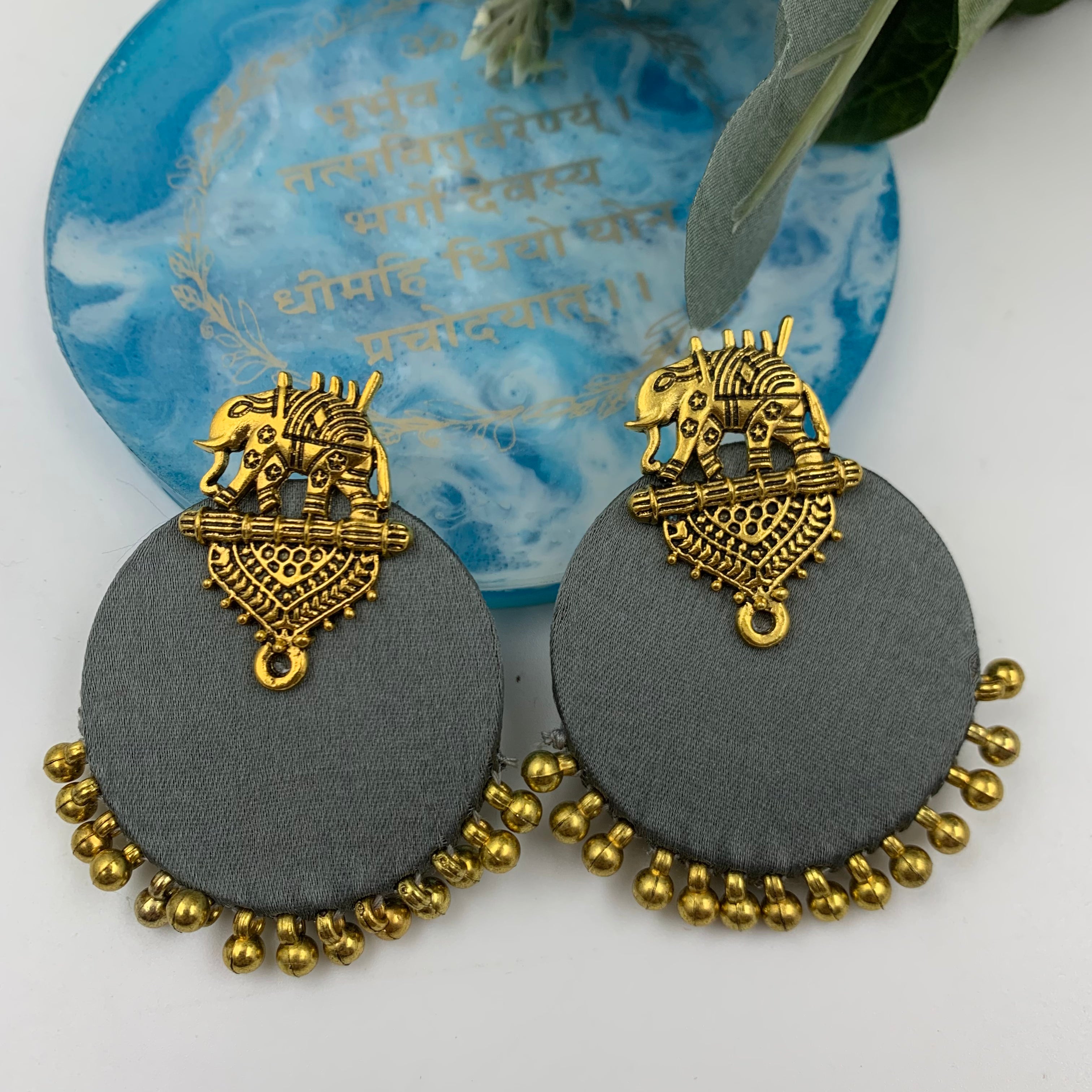 Buy Grey Fabric Elephant Earrings In Gold By Fabriety In India